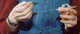 Abigail working on a doily